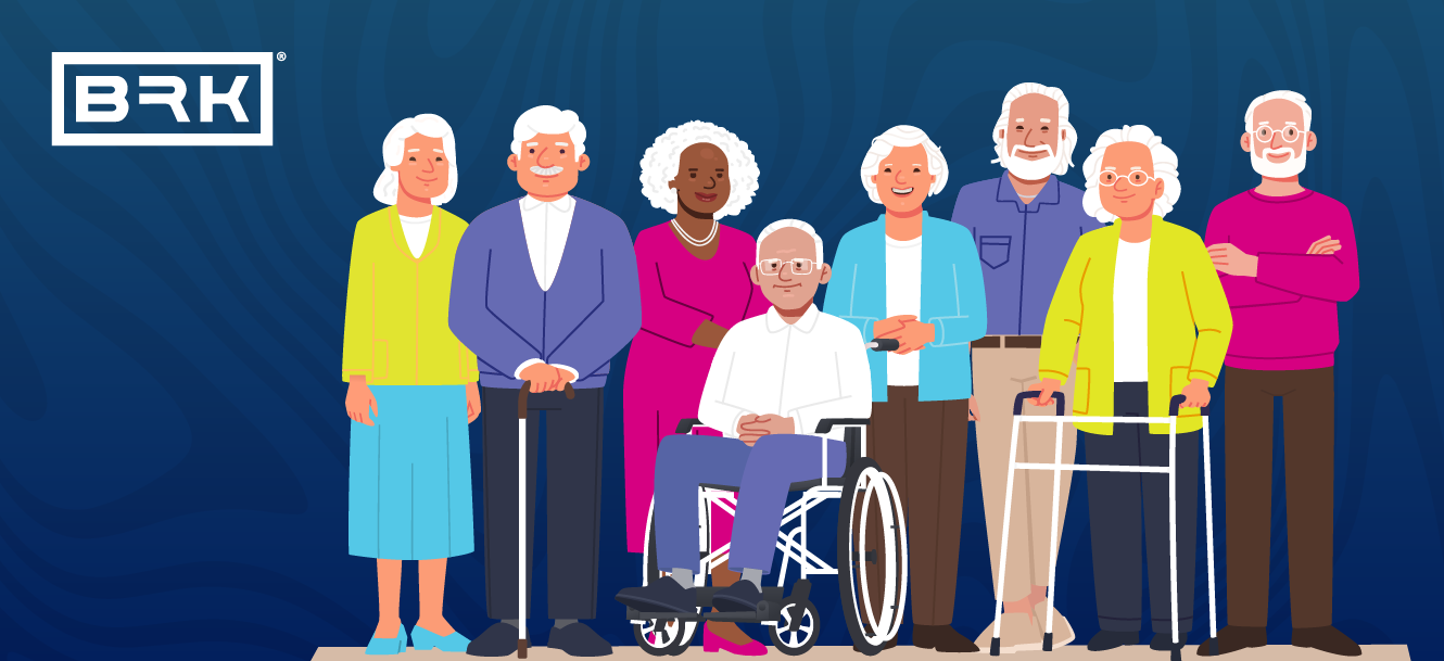 A group of elderly people standing in front of a blue background.